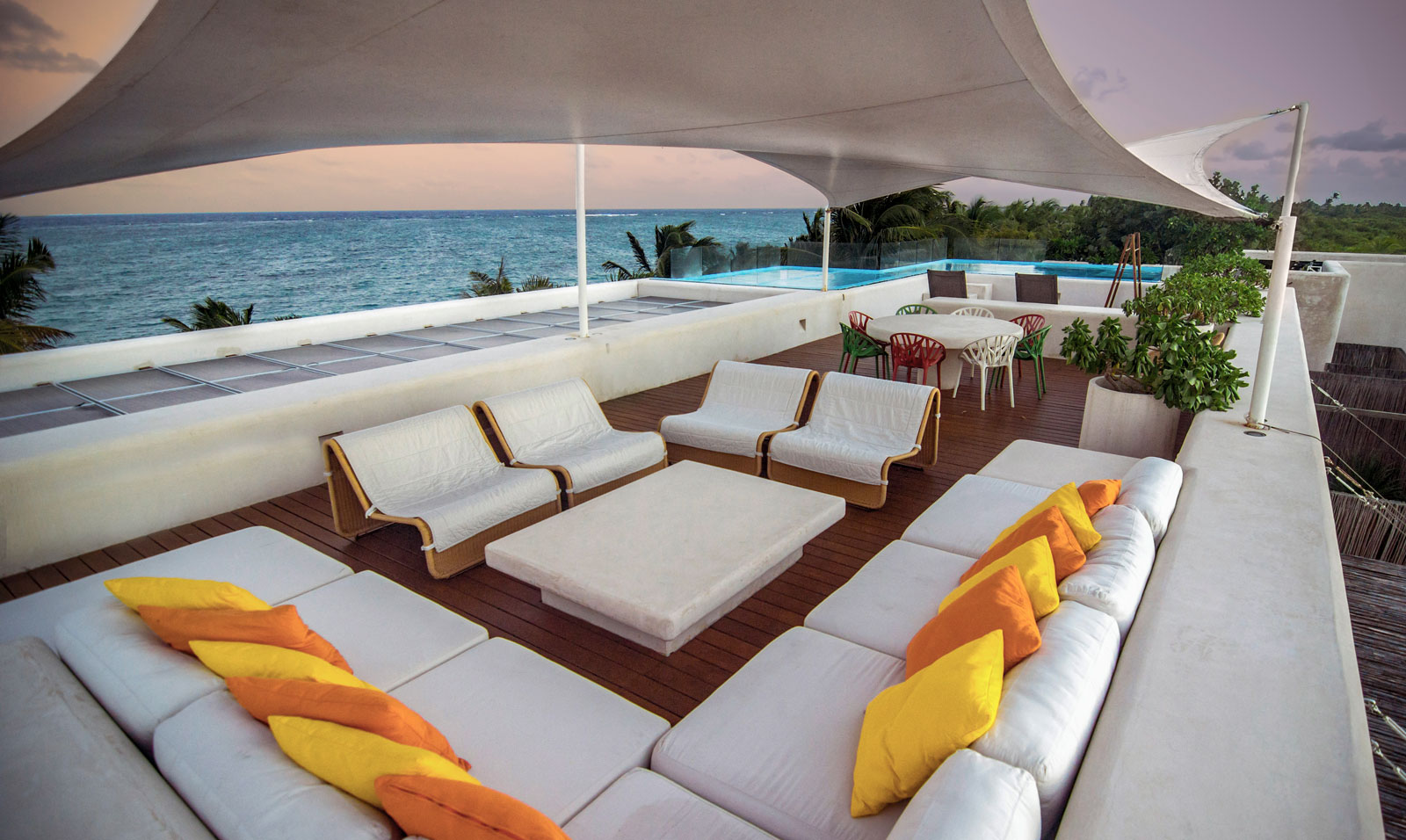 Casa Ikal in Sian Ka'an Terrace with outdoor dining, living and ocean view