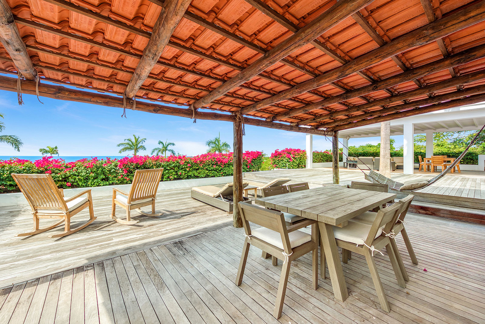 Maya_Luxe_Luxury_Villas_Experiences_St_Martin_La_Hacienda_10_LaHacienda-OutdoorSeating-(in-front-of-bedroom-3-and-4)